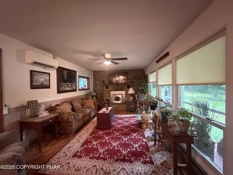 Living - 458 Briscoe Mountain Rd, Dingmans Ferry, PA 18328 photo 1 of 1