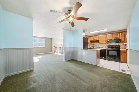 Living - 1828 Ivanhoe Dr, Irwin, PA 15642 photo 3 of 4