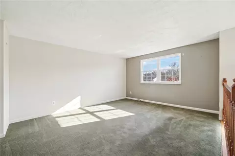 Living - 1828 Ivanhoe Dr, Irwin, PA 15642 photo 2 of 4