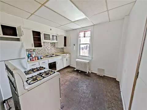 Kitchen - 203 Comrie Ave, Braddock, PA 15104 photo 1 of 2