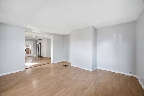 Living - 212 Comrie Ave, Braddock, PA 15104 photo 2 of 3
