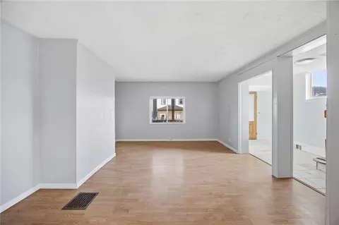 Living - 212 Comrie Ave, Braddock, PA 15104 photo 1 of 3