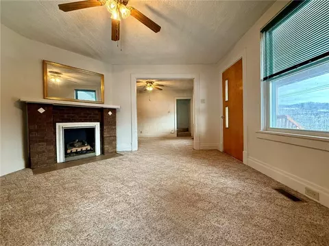 Living - 1126 Penn Ave, Vandergrift, PA 15690 photo 4 of 9