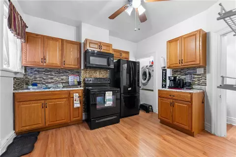Kitchen - 628 E 9th Ave, Homestead, PA 15120 photo 2 of 3