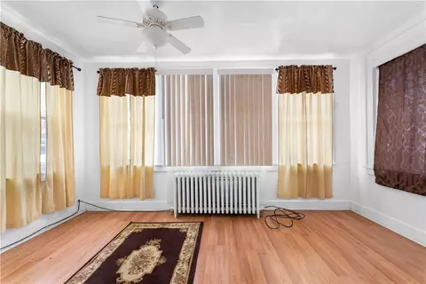 Living - 628 E 9th Ave, Homestead, PA 15120 photo 2 of 2