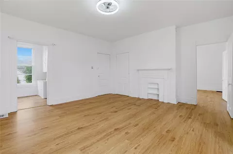 Living - 153 Comrie Ave, Braddock, PA 15104 photo 4 of 10