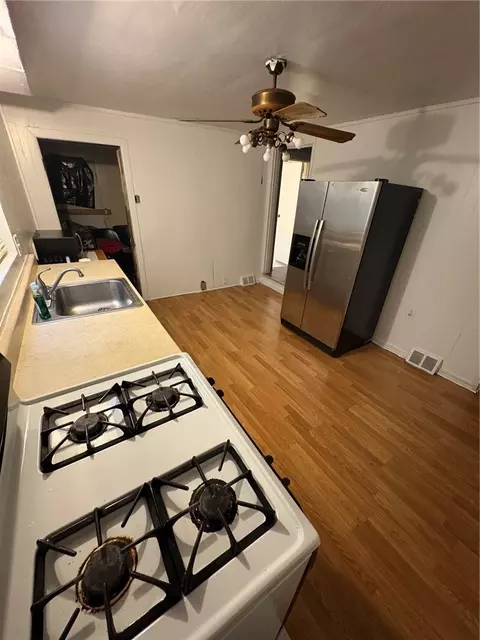 Kitchen - 907 Walnut St, Braddock, PA 15104 photo 4 of 4