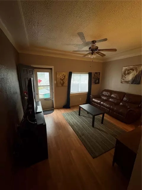 Living - 907 Walnut St, Braddock, PA 15104 photo 2 of 2