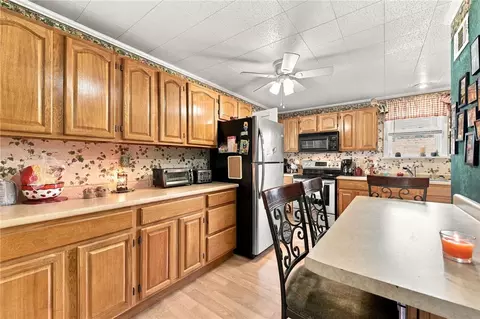 Kitchen - 305 E 3rd St, Derry, PA 15627 photo 2 of 2