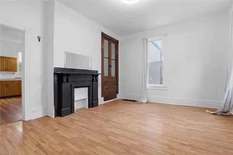 Living - 153 Comrie Ave, Braddock, PA 15104 photo 7 of 13
