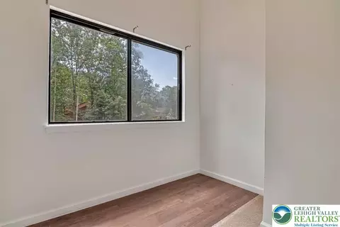 Bedroom - 213 Falls Cir, Saw Creek, PA 18324 photo 1 of 6