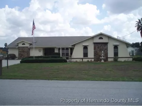 7728 Holiday Dr, Spring Hill, FL 34606 photo 1