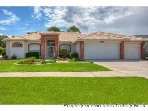 1064 Tournament Dr, Spring Hill, FL 34608 photo 1