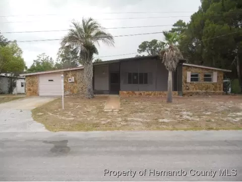 7041 Mertal St, Weeki Wachee, FL 34607 photo 1