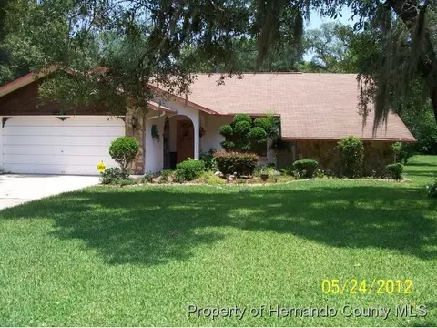 1544 Alameda Dr, Spring Hill, FL 34609 photo 1