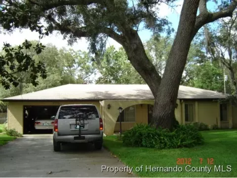 7402 Turf Ln, Spring Hill, FL 34606 photo 1