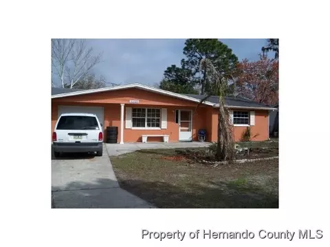 4038 Sugarfoot Dr, Spring Hill, FL 34606 photo 1