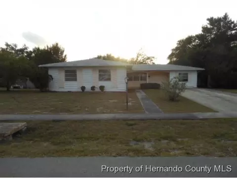 6883 Treehaven Dr, Spring Hill, FL 34606 photo 1