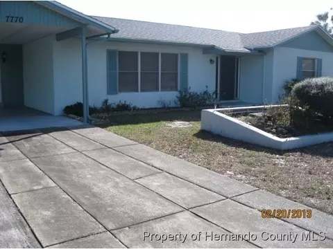 7770 Pinehurst Dr, Spring Hill, FL 34606 photo 1