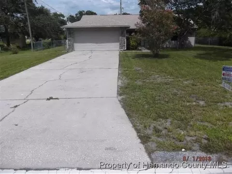 384 Cobblestone Dr, Spring Hill, FL 34606 photo 1