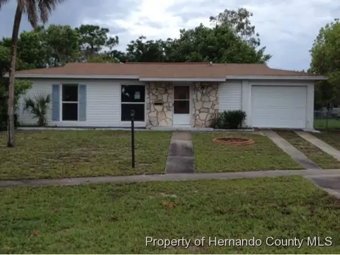 1131 Cobblestone Dr, Spring Hill, FL 34606 photo 1