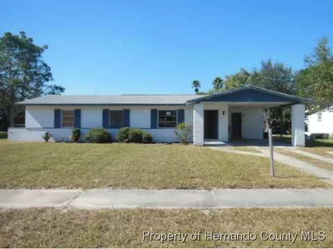 7537 Pinehurst Dr, Spring Hill, FL 34606 photo 1