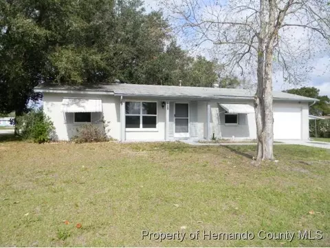 9445 Miracle Dr, Spring Hill, FL 34608 photo 1