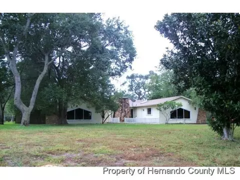 8018 Chaucer Dr, Weeki Wachee, FL 34607 photo 1