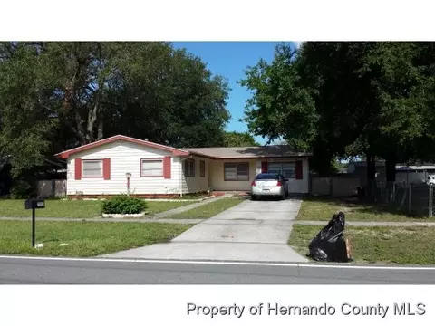 7553 Pinehurst Dr E, Spring Hill, FL 34606 photo 1