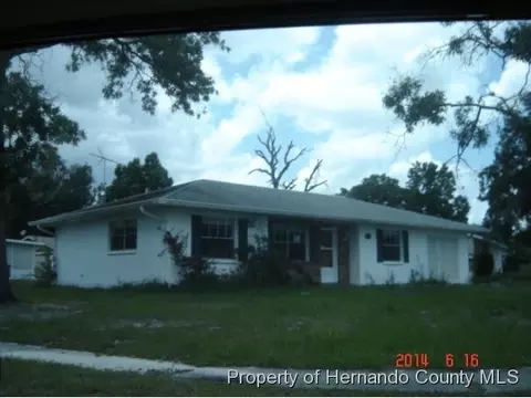 5017 Springwood Rd, Spring Hill, FL 34609 photo 1