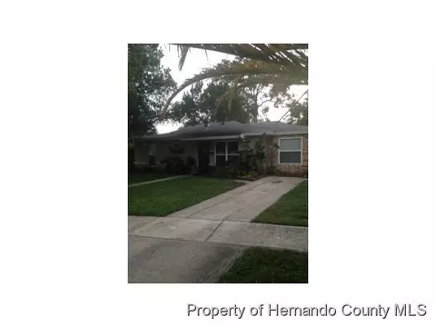 1049 Cobblestone Dr, Spring Hill, FL 34606 photo 1