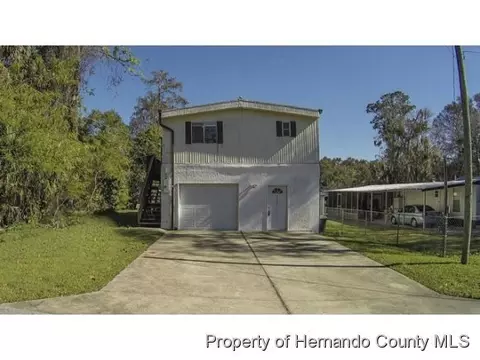 7288 Coventry Ct, Weeki Wachee, FL 34607 photo 1