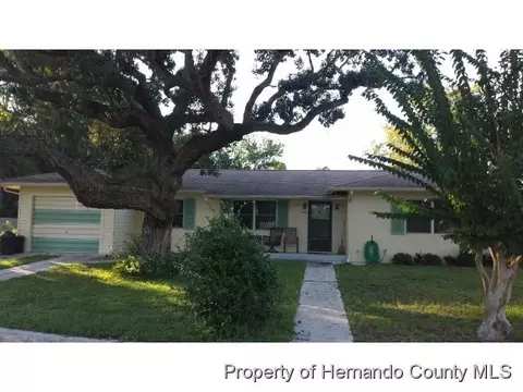 7439 Pinehurst Dr, Spring Hill, FL 34606 photo 1