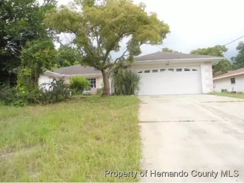 1410 Piper Rd, Spring Hill, FL 34607 photo 1