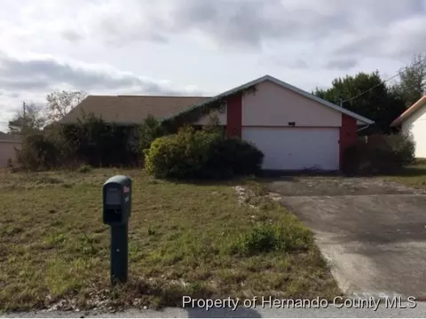 11046 Montcalm Rd, Spring Hill, FL 34608 photo 1