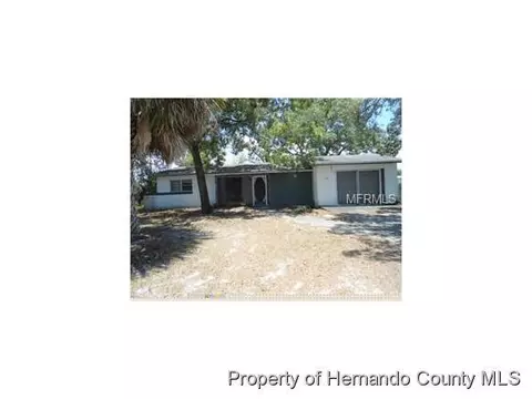 7780 Pinehurst Dr, Spring Hill, FL 34606 photo 1