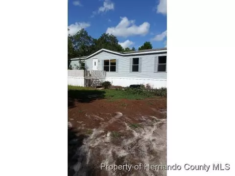 14375 Highgrove Rd, Spring Hill, FL 34609 photo 1