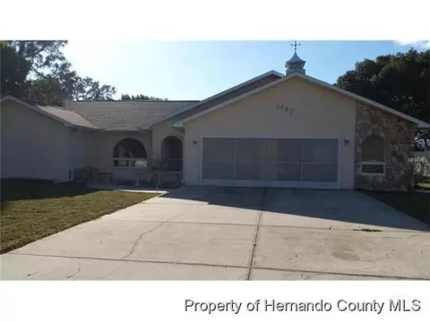 1757 Alameda Dr, Spring Hill, FL 34609 photo 1