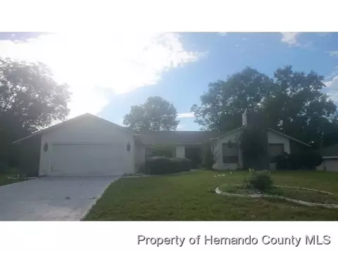 12194 Lamont Dr, Spring Hill, FL 34608 photo 1