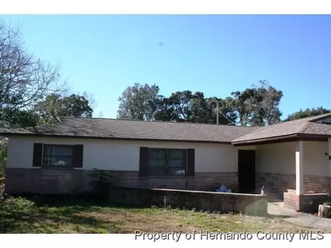 6124 Pinehurst Dr, Spring Hill, FL 34606 photo 1
