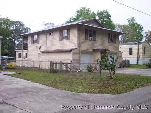 6833 Richard Dr E, Weeki Wachee, FL 34607 photo 1