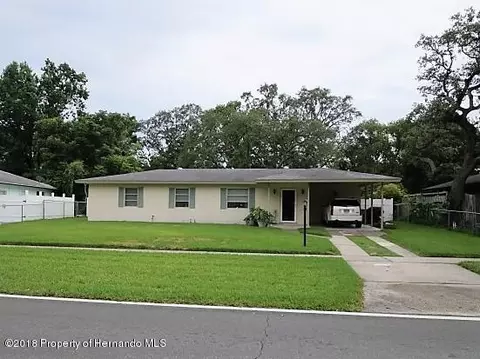7739 Pinehurst Dr, Spring Hill, FL 34606 photo 1
