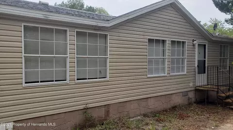 6087 Cartwrite Rd, Spring Hill, FL 34609 photo 1