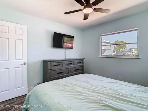 Bedroom - 4984 Cedarbrook Ln, Hernando Beach, FL 34607 photo 8 of 10