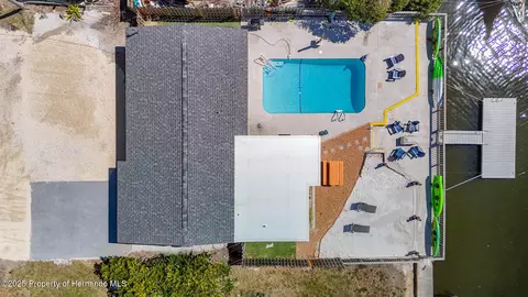 Exterior - 4984 Cedarbrook Ln, Hernando Beach, FL 34607 photo 1 of 9