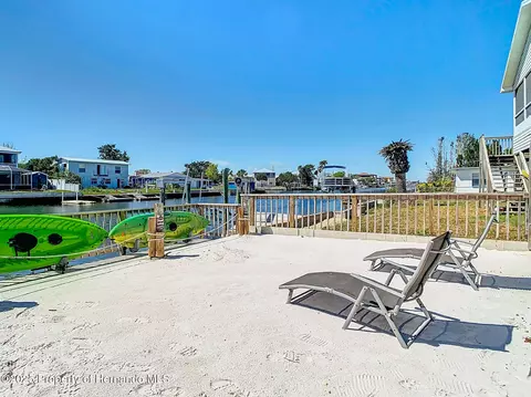 Exterior - 4984 Cedarbrook Ln, Hernando Beach, FL 34607 photo 2 of 9