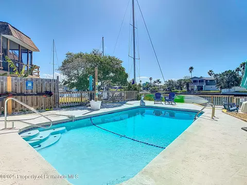 Exterior - 4984 Cedarbrook Ln, Hernando Beach, FL 34607 photo 4 of 9