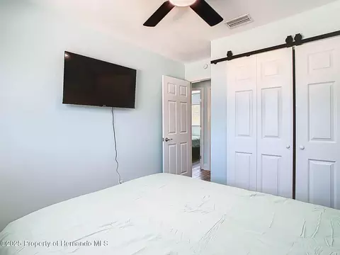 Bedroom - 4984 Cedarbrook Ln, Hernando Beach, FL 34607 photo 7 of 10
