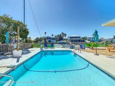 Exterior - 4984 Cedarbrook Ln, Hernando Beach, FL 34607 photo 3 of 9