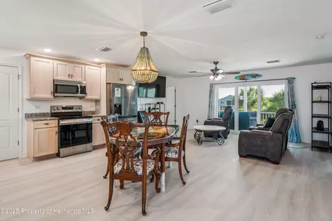 Dining - 3270 Hibiscus Dr, Hernando Beach, FL 34607 photo 1 of 2